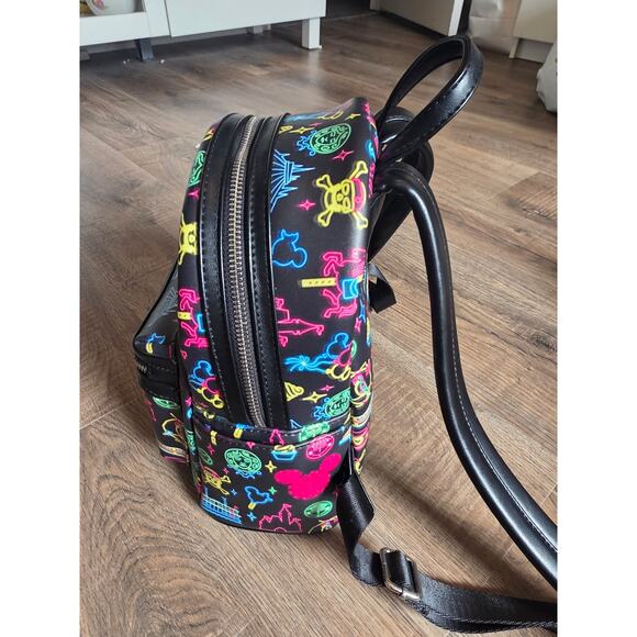 Disney Parks Loungefly Neon Glow Mini Park Attraction icon Backpack - Picture 3 of 7